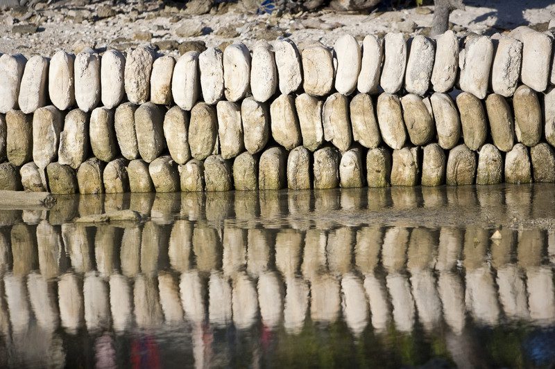 Sandbags protecting homes from flooding, Kiribati