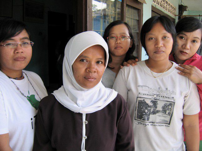 Indonesia. Yati, Kurbana, Puryati and Johanna all work making sportswear for FILA, Le Coq Sportif and other brands. Photo: Kelly Dent/OxfamAUS