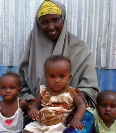 Ambiyo with her triplets. Photo: OxfamAUS Ambiyo with her triplets. Photo: OxfamAUS