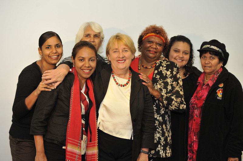 enny Macklin (centre) meets with women from the Straight Talk conference