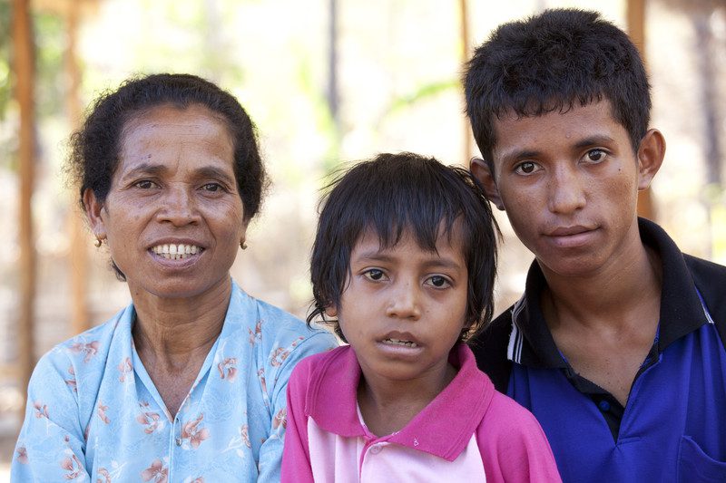 Alysia with two of her sons. Photo: Timothy Herbert/OxfamAUS