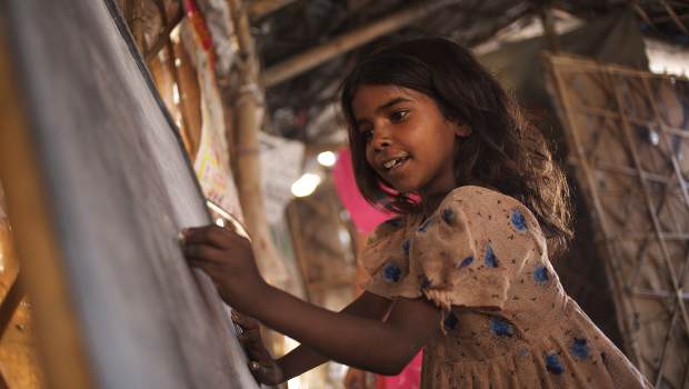 Learning at Apna Kendra bridge school for working children in India. Image: Oxfam