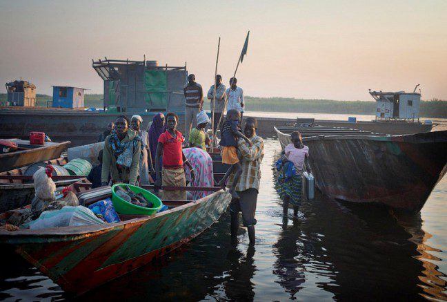 Hundreds of people arrive daily to Awerial having fled from the conflict in and around the town Bor. People travel through the night on barges with the little they could grab from home. Picture: www.geoffpugh.com SouthSudan Barge