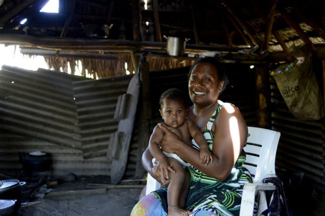 Leanne and her daughter. Photo: Amy Christian/OxfamAUS The aftermath of Cyclone Pam in Utas, Vanuatu. Photo: Amy Christian/OxfamAUS