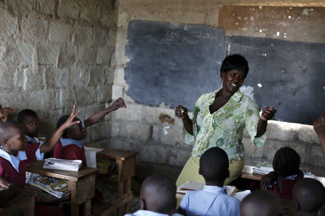 Winifred teaches a class at Reuben Baptist School. Photo: Sam Tarling/Oxfam