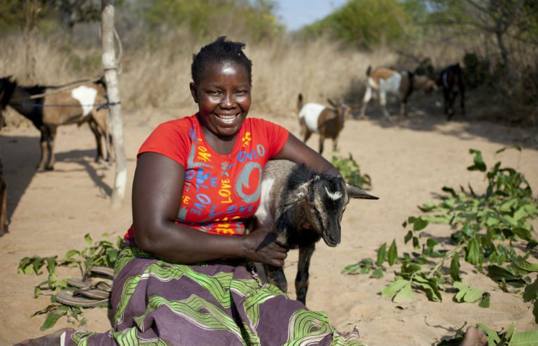 Delfinia with her goats. Photo: Abbie Trayler-Smith/OxfamAUS