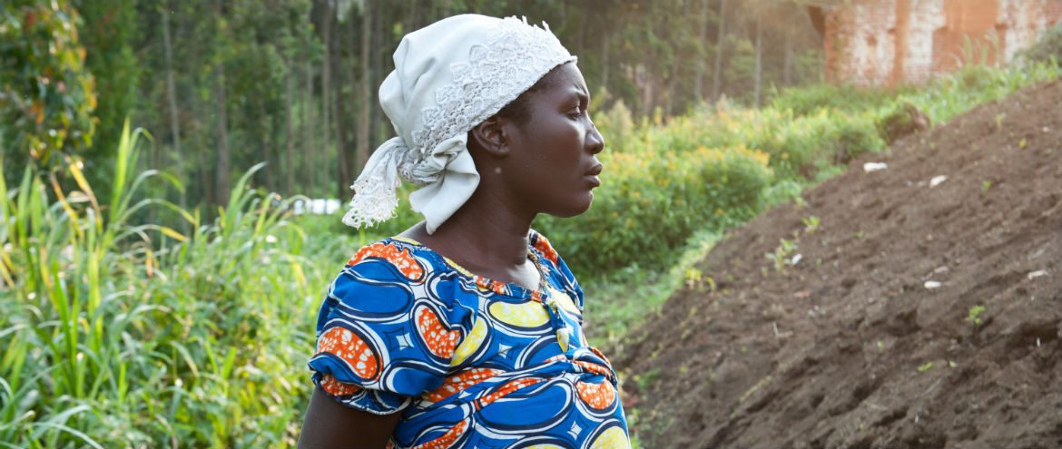 City2Surf: Louise stands in a field in the Democratic Republic of Congo