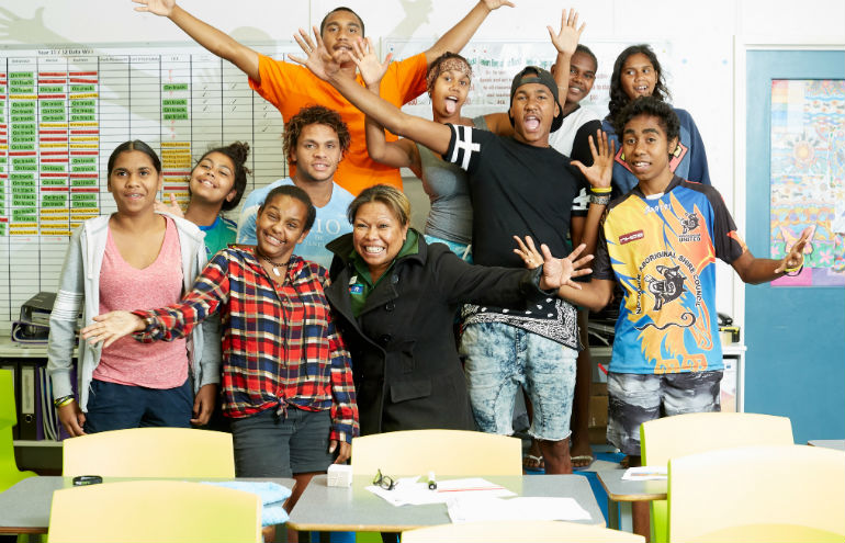 A group of Indigenous Australians cheering