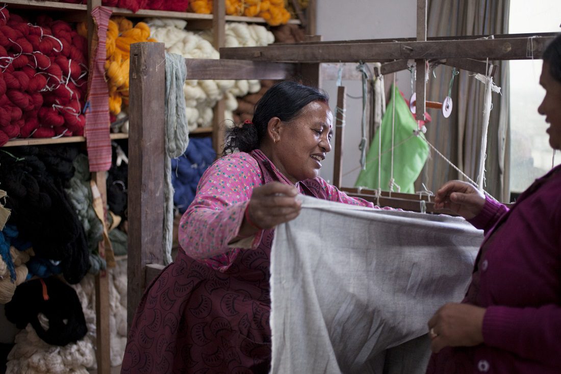 Kathmandu, Nepal: A worker at Durga Maharjan's weaving business. Photo: Abbie Trayler-Smith/OxfamAUS