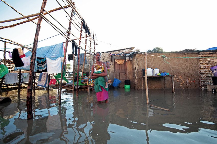 Cyclone Idai survivor Esther at her flooded house in Mozambique