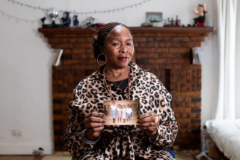Melbourne, Australia: Melbourne, Australia: Lucy holds an old photo of her daughter Susan. The mother and daughter were separated in Sudan in 1988, due to civil war, and they eventually reunited six years later in Australia. Photo: Kim Landy/OxfamAUS. Melbourne, Australia: Melbourne, Australia: Lucy holds an old photo of her daughter Susan. The mother and daughter were separated in Sudan in 1988, due to civil war, and they eventually reunited six years later in Australia. Photo: Kim Landy/OxfamAUS.