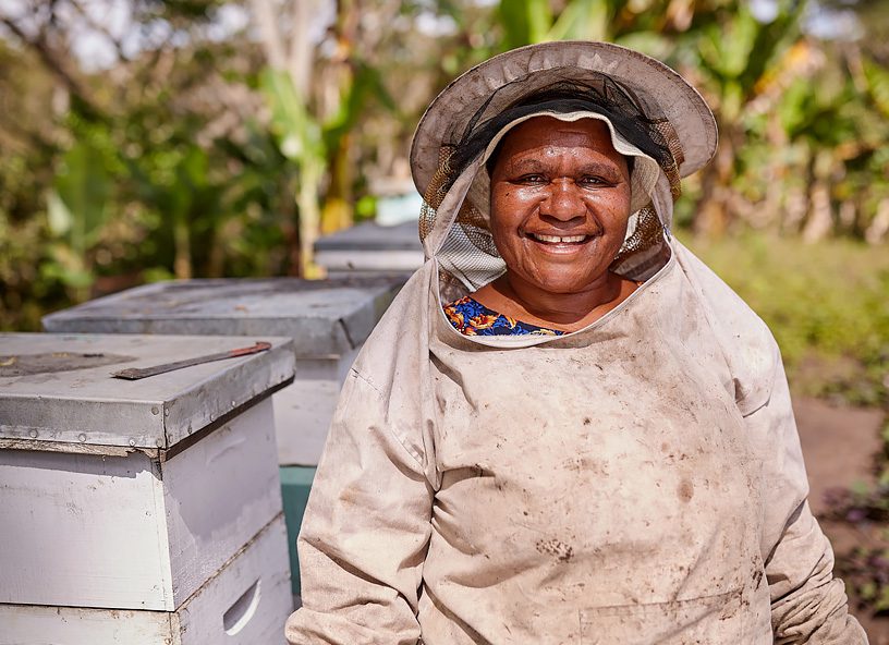 Onano, Bee keeper in Papua New Guinea. Photo: Patrick Moran/OxfamAUS