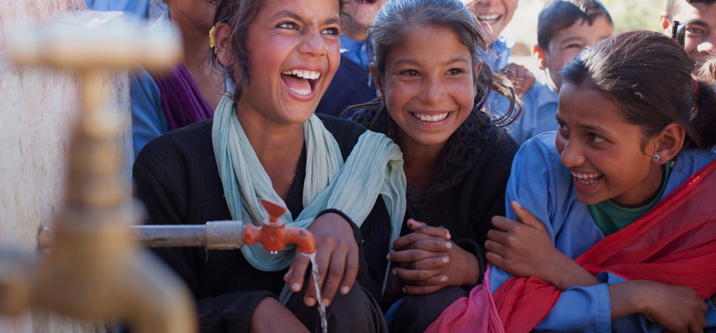 Students in Nepal pose for pictures with their recently installed tap stand. Photo: Abbie Trayler-Smith/Oxfam AUS Students in Nepal pose for pictures with their recently installed tap stand. Photo: Abbie Trayler-Smith/Oxfam AUS