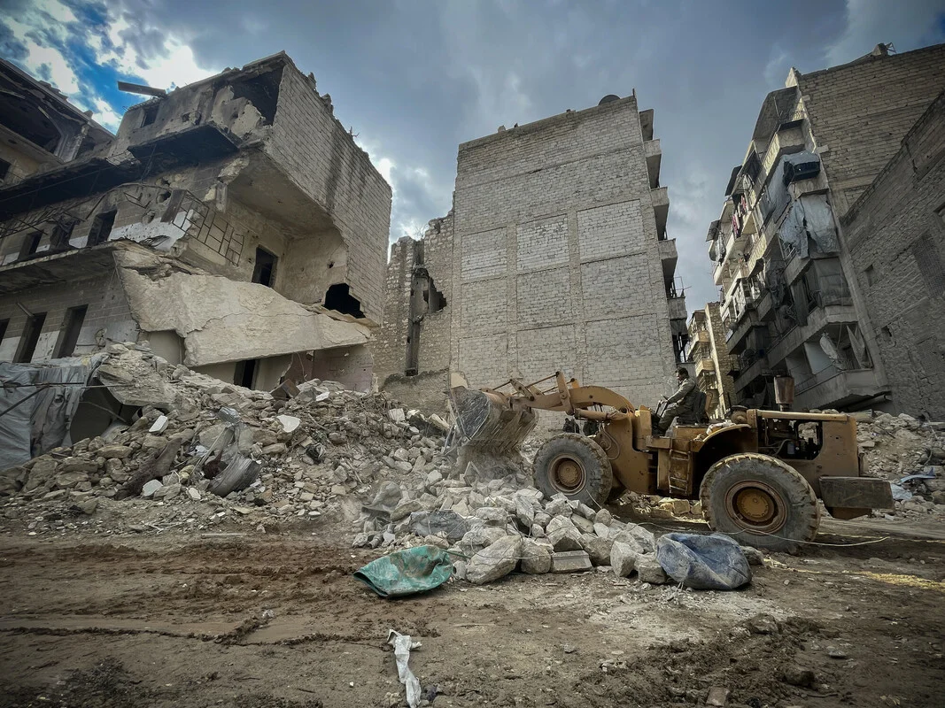 Destroyed buildings by the 7.8 magnitude earthquake that hit Syria on 6 February in Al-Helwanieh of Aleppo. Rescue teams are shown in the picture while trying to pull out people who are stuck under the rubble. Southeast Turkiye and Syria earthquake