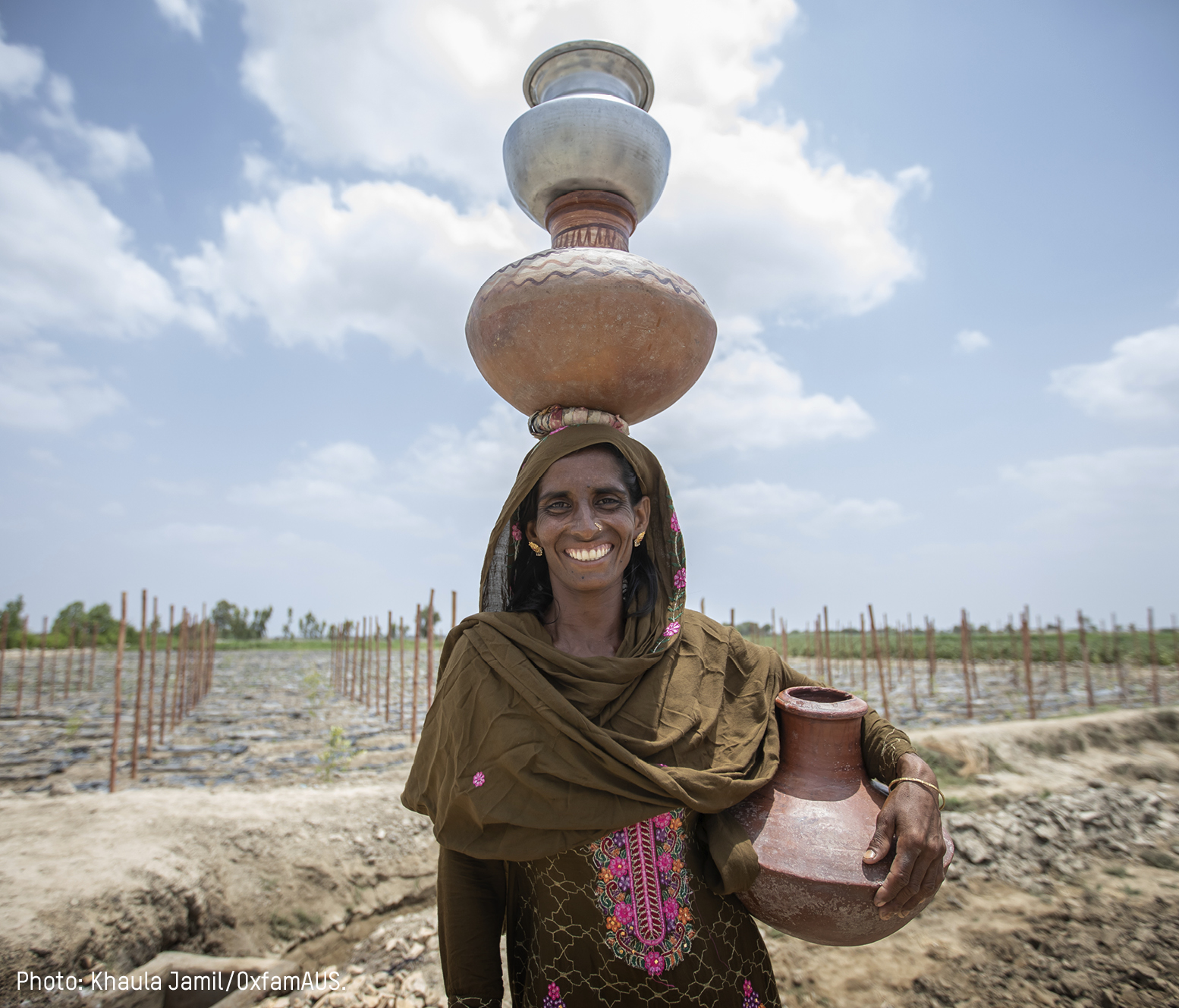 Pakistan, Asia: Mehrunnisa, 42, is a beneficiary of a High Efficiency Irrigation System and General Secretary of her Community Organisation. Through Oxfam's training Mehrunnisa has learnt to save every drop of water and grow her own vegetables. She often walks for an hour to collect water. Khaula Jamil/OxfamAUS