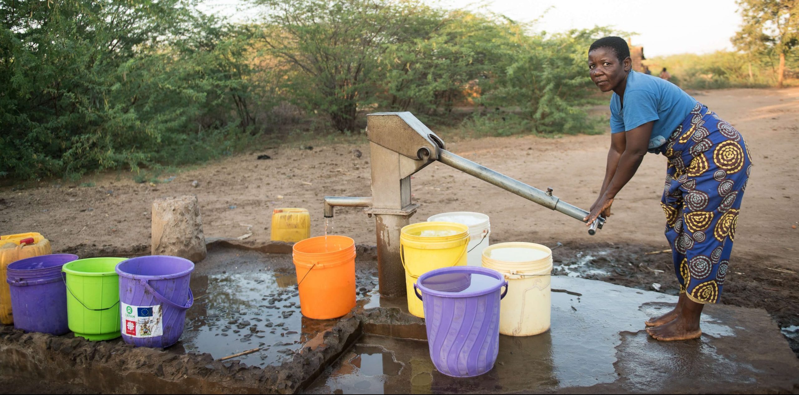 Joyce Luka who was displaced by Tropical Storm Ana and now lives in a well-wisher’s house is seen drawing water at a borehole at their village in Chikwawa, southern Malawi on 9 September 2022. Photo: Thoko Chikondi/Oxfam