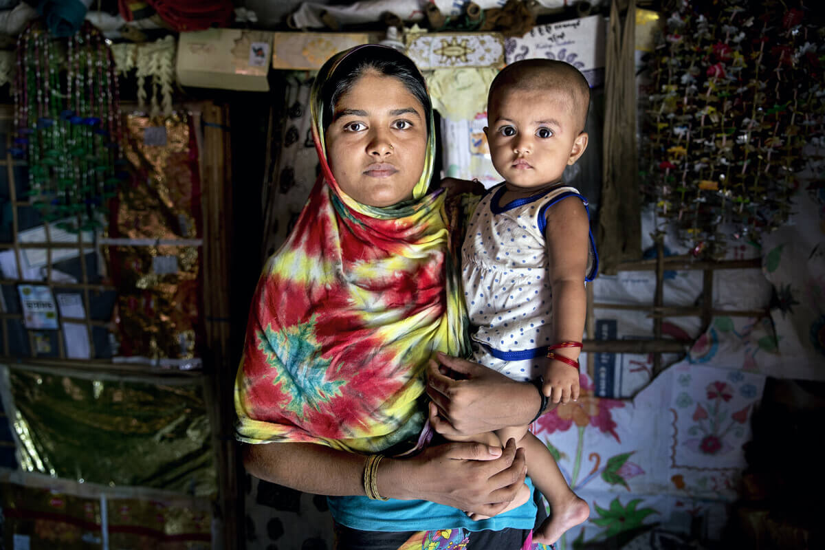 Hafeza* lives with her child in a Rohingya Refugee Camp, Bangladesh. Credit: Fabeha Monir/ Oxfam  Hafeza* lives with her child in a Rohingya Refugee Camp, Bangladesh. Credit: Fabeha Monir/ Oxfam