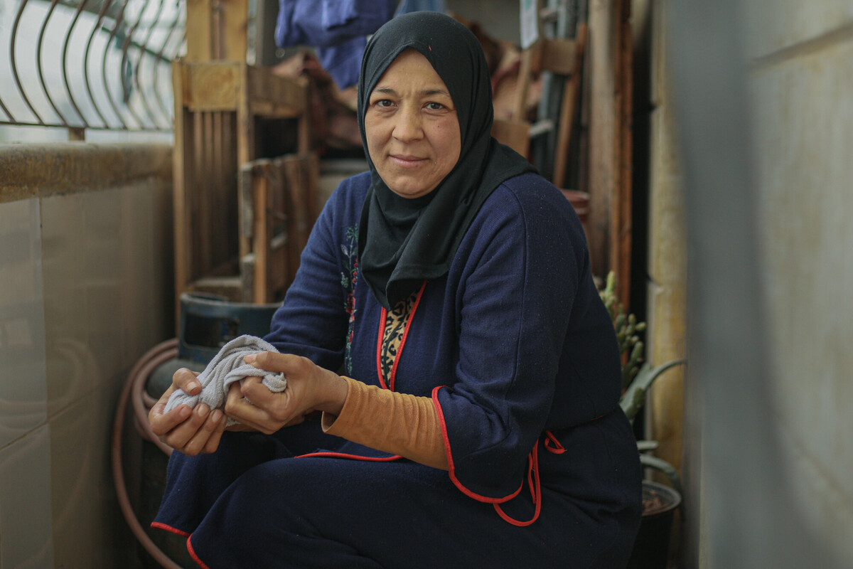 Aleppo city, Syria: A woman who was severely affected by the earthquake in Aleppo utilizes the hygiene supplies she earlier received from Oxfam to help her maintain good hygiene habits. Photo: Islam Mardini/ Oxfam