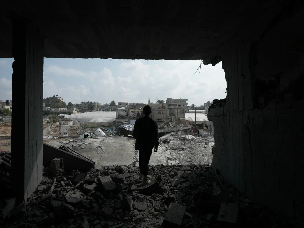Gaza, Palestinian Territory, Occupied: A boy standing on his bombed house by an Israeli airstrike in Rafah that took place in mid-February 2024. a heavy attack by the Israeli military where around 100 Palestinians were killed in one night in Rafah only. Alef Multimedia/ Oxfam