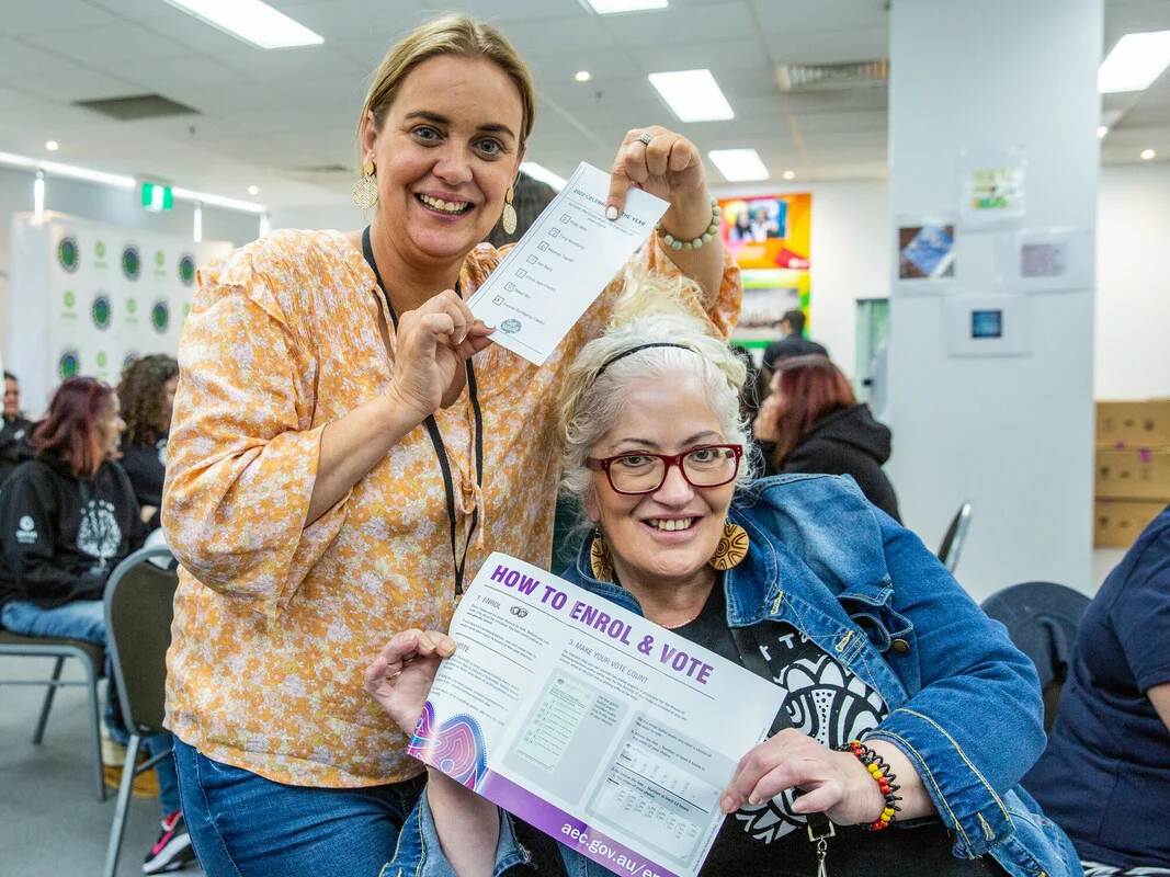 Canberra, Australia: Leanne Sanders and Nicole Bloomfield vote for well known First Nations people in a mock ballot staged by the Australian Electoral Commission to demonstrate the preferential voting system, just one of the many sessions at the 2022 Straight Talk National Summit. Jillian Mundy/Oxfam Canberra, Australia: Leanne Sanders and Nicole Bloomfield vote for well known First Nations people in a mock ballot staged by the Australian Electoral Commission to demonstrate the preferential voting system, just one of the many sessions at the 2022 Straight Talk National Summit. Jillian Mundy/Oxfam