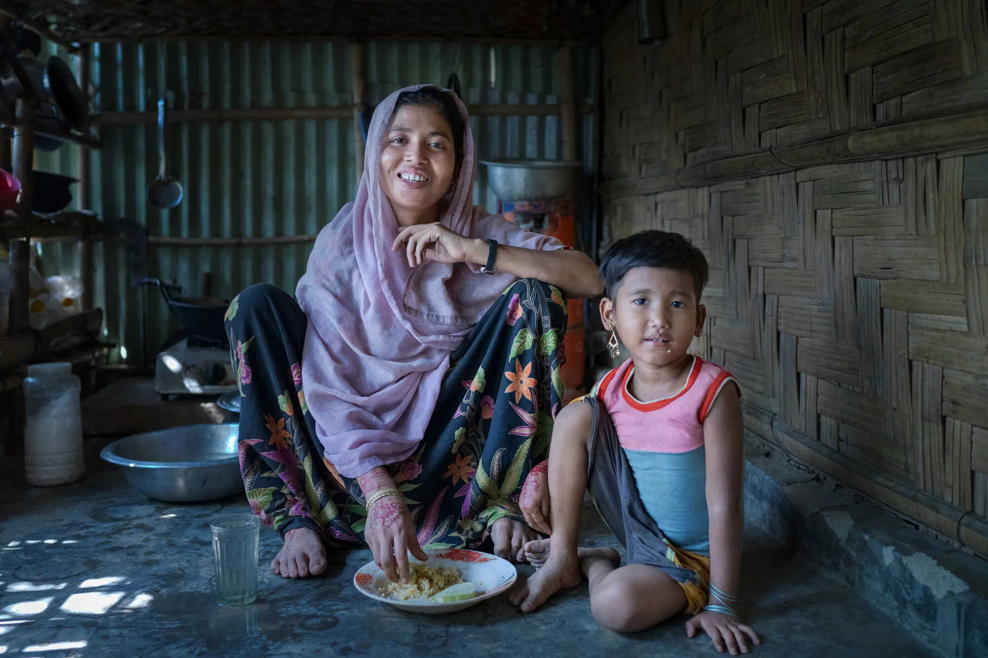 Cox’s Bazar, Bangladesh: Shamsun Nahar is a Rohingya refugee and has been living in Cox's Bazar camp for seven years, where three of her children were born. Photo: Fabeha Monir/Oxfam. Oxfam acknowledges the support of the Australian Government through the Australian Humanitarian Partnership (AHP). Cox’s Bazar, Bangladesh: Shamsun Nahar is a Rohingya refugee and has been living in Cox's Bazar camp for seven years, where three of her children were born. Photo: Fabeha Monir/Oxfam. Oxfam acknowledges the support of the Australian Government through the Australian Humanitarian Partnership (AHP).