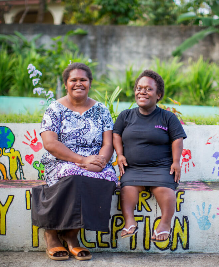 Vanuatu: Judith and Magret at the Vanuatu Society for People with Disabilities (VSPD). Judith Iakavai is the program manager at VSPD. Her hope for the future is to see her friends with disabilities reach their life goals and for disability inclusion in all spaces across Vanuatu. Photo: Arlene Bax/Oxfam. Oxfam acknowledges the support of the Australian Government through the Australian NGO Cooperation Program (ANCP).