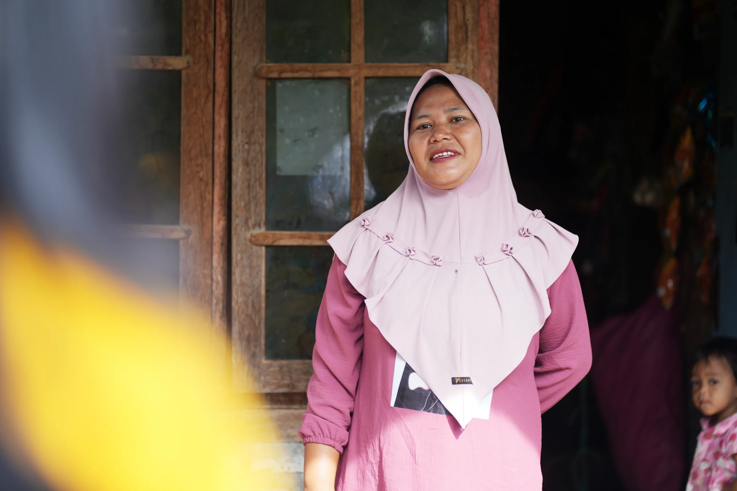 Lombok, Indonesia: Husaini's community experiences frequent flash floods and earthquakes. She received resources from Oxfam local partner, KONSEPSI, for an emergency bag in preparation for disasters. Photo: Aimee Han/Oxfam