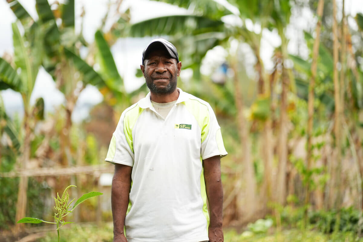 Papua ​New ​Guinea: The installation of three water taps in Somano's hamlet has allowed him to grow an abundant garden. The garden harvest contributes to feeding his family, fellow hamlet members, and gaining some household income through sales at the local market. Photo: Aimee Han/Oxfam